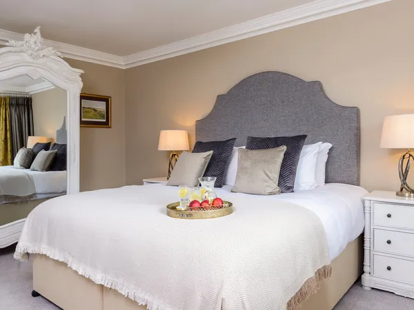 The Junior King room at Kenmare House, light and elegantly furnished