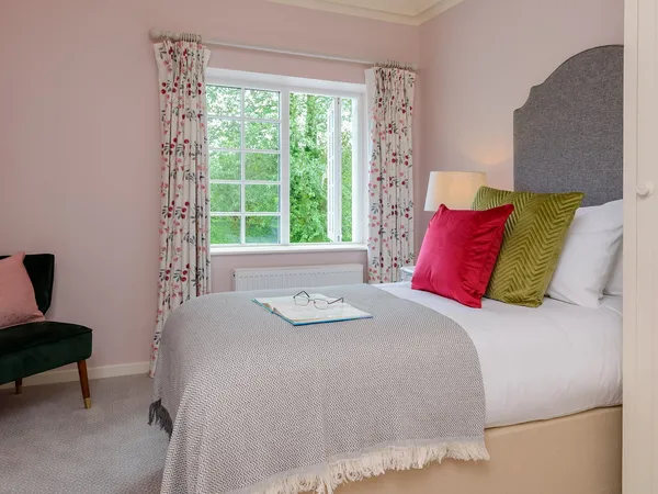 A single room at Kenmare House, comfortable and traditionally styled
